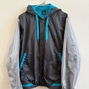 Vintage Air Jordan Men's Varsity 2.0 Hoodie. Black and Gray windbreaker jacket.